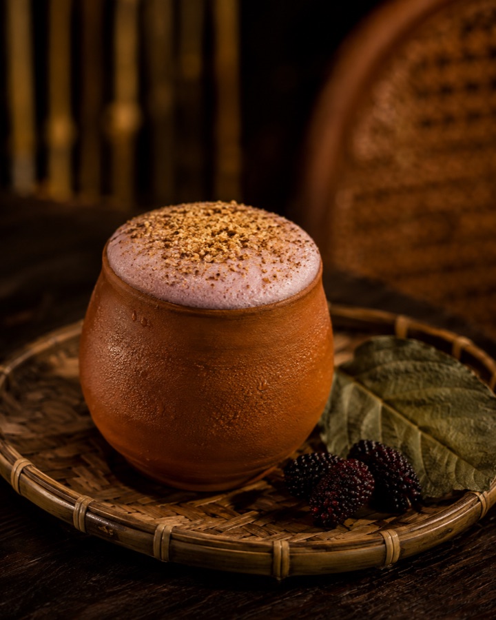 Plain of Jars cocktail served in a small clay jar